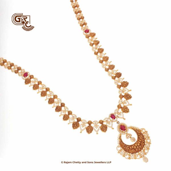 Glitering Stone Antique Lakshm Pentant Haram With Earring